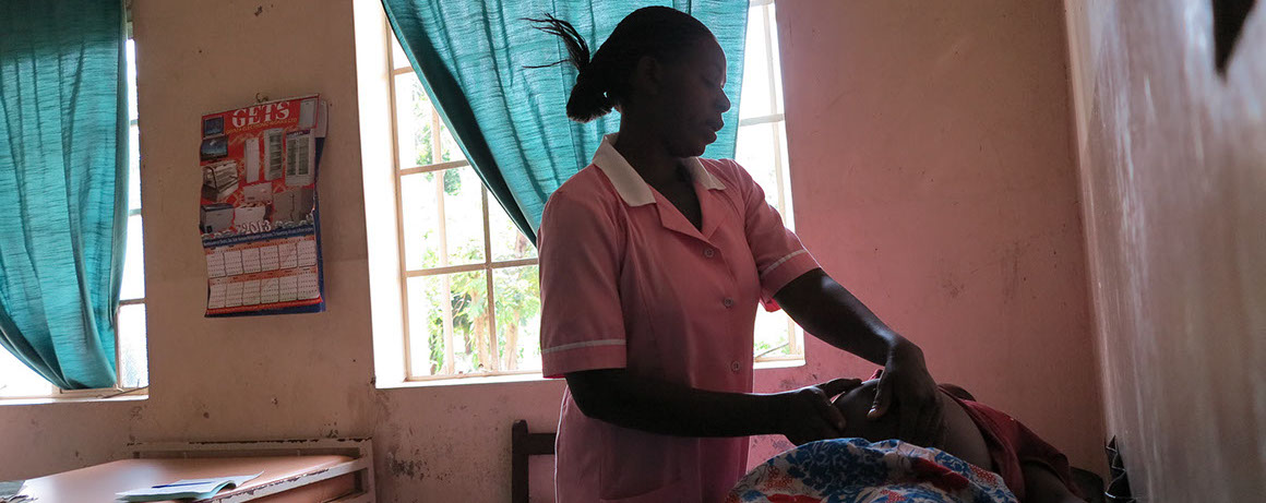 woman nurse taking care of pregnant woman